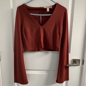Rust-colored long sleeve top; never worn!